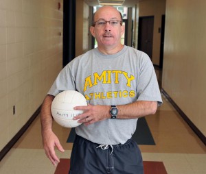 Photo by Peter Casolino/Register Paul Thees is back as the head coach of the Amity volleyball team. Thees coached Amity for 16 seasons before resigning in 2007.